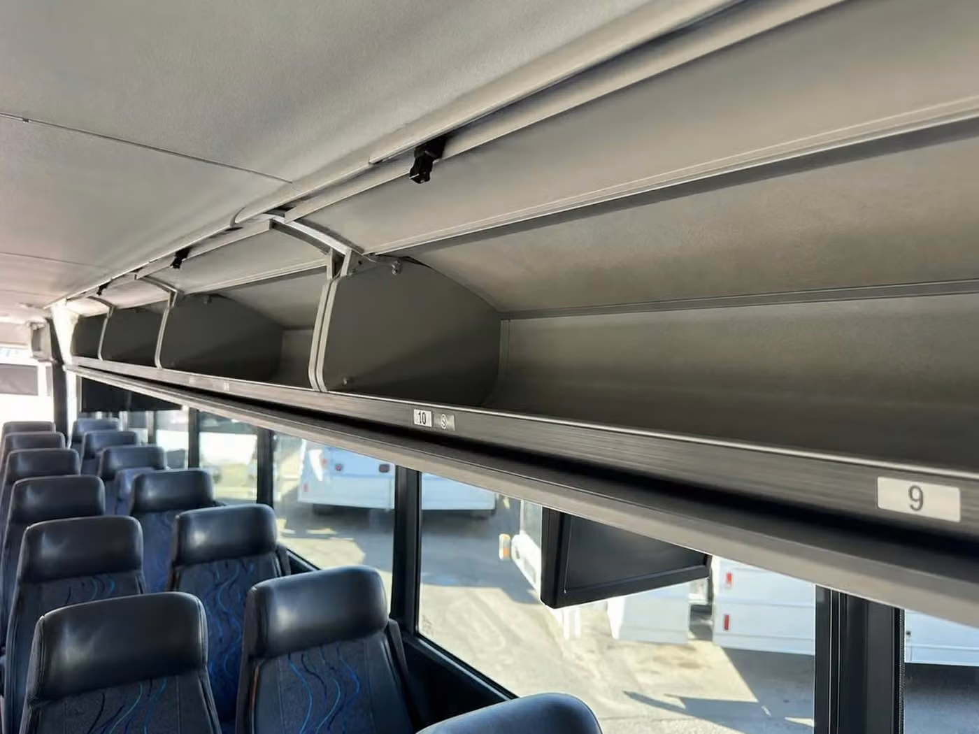dover 25 passenger minibus overhead storage
