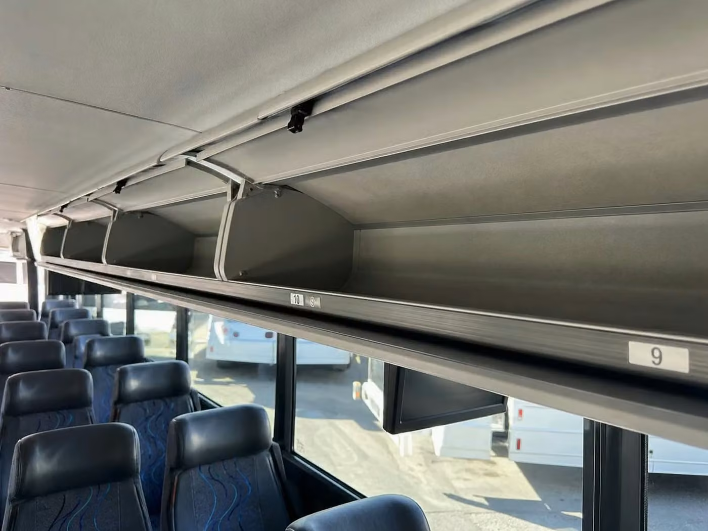 dover 35 passenger minibus overhead storage