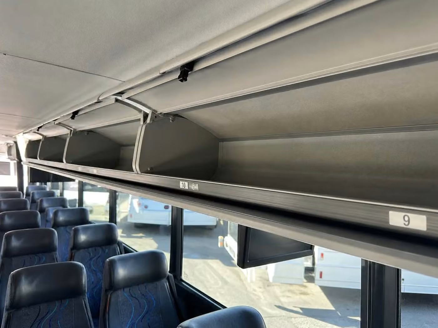 dover charter bus overhead storage